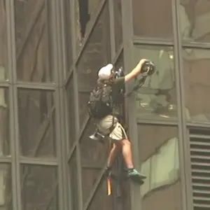 Human fly climbs up Trump Tower